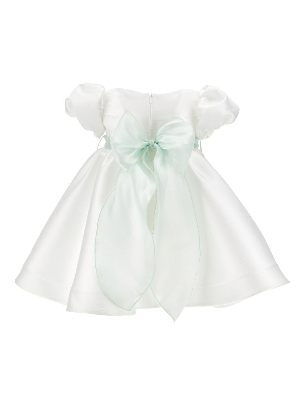 Abito per neonata Monnalisa bianco con dettaglio con fiocco e con fiore - Rubino Kids