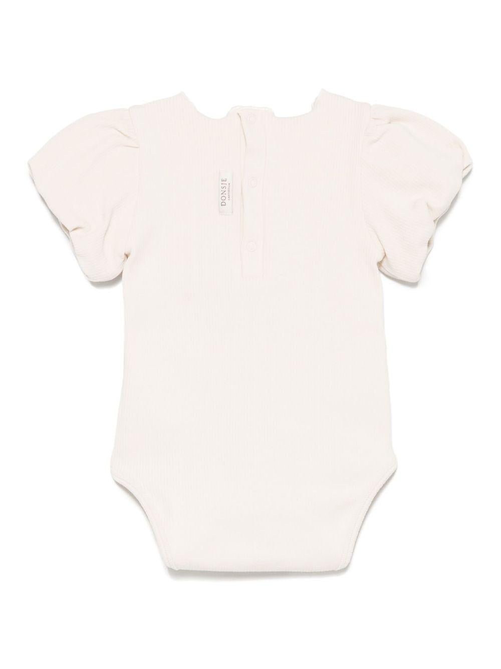 Body per neonata Donsje Nowie beige con motivo con ricamo - Rubino Kids