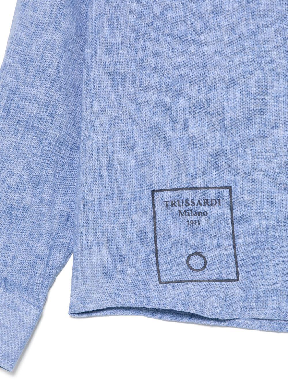 Camicia per bambino Trussardi Junior blu con stampa sul fondo e falsatura frontale con abbottonatura - Rubino Kids