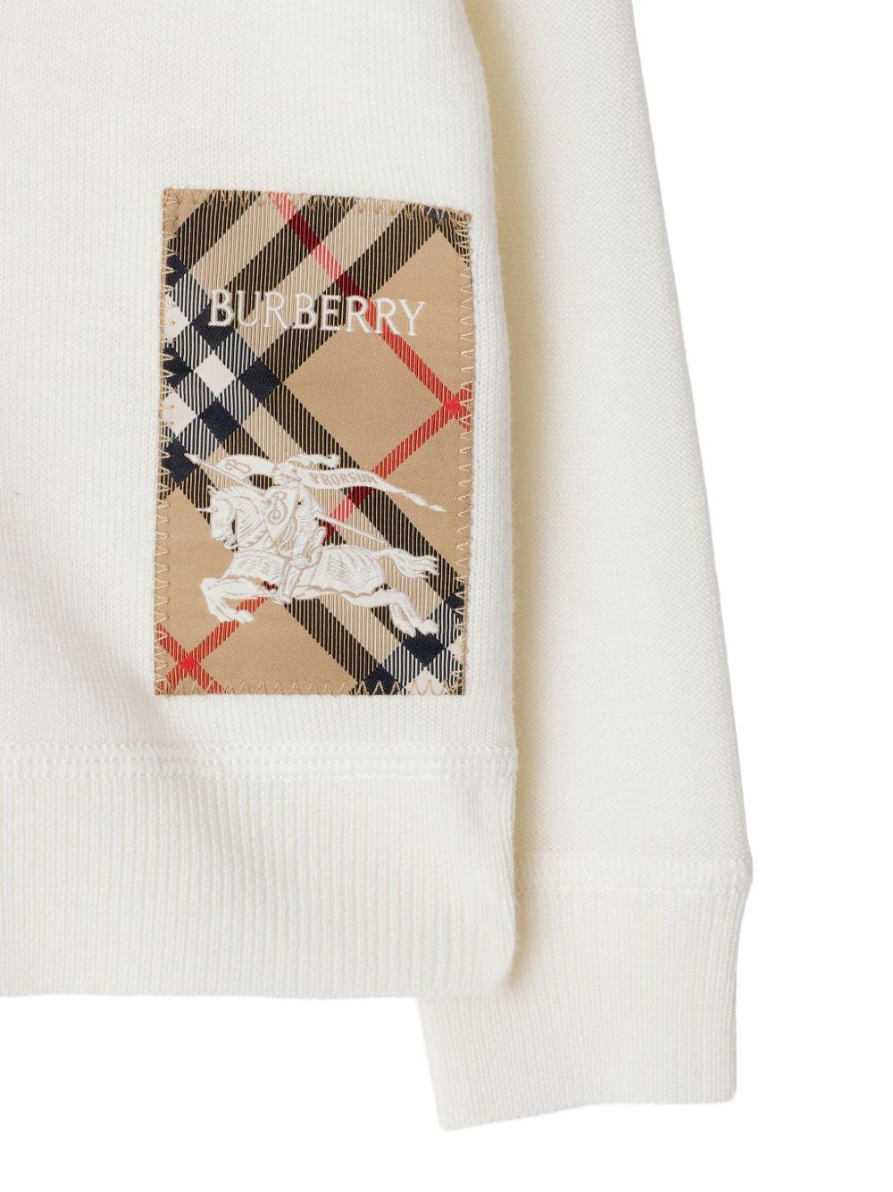 Cardigan per neonato Burberry Kids bianco in lana con applicazione logo - Rubino Kids