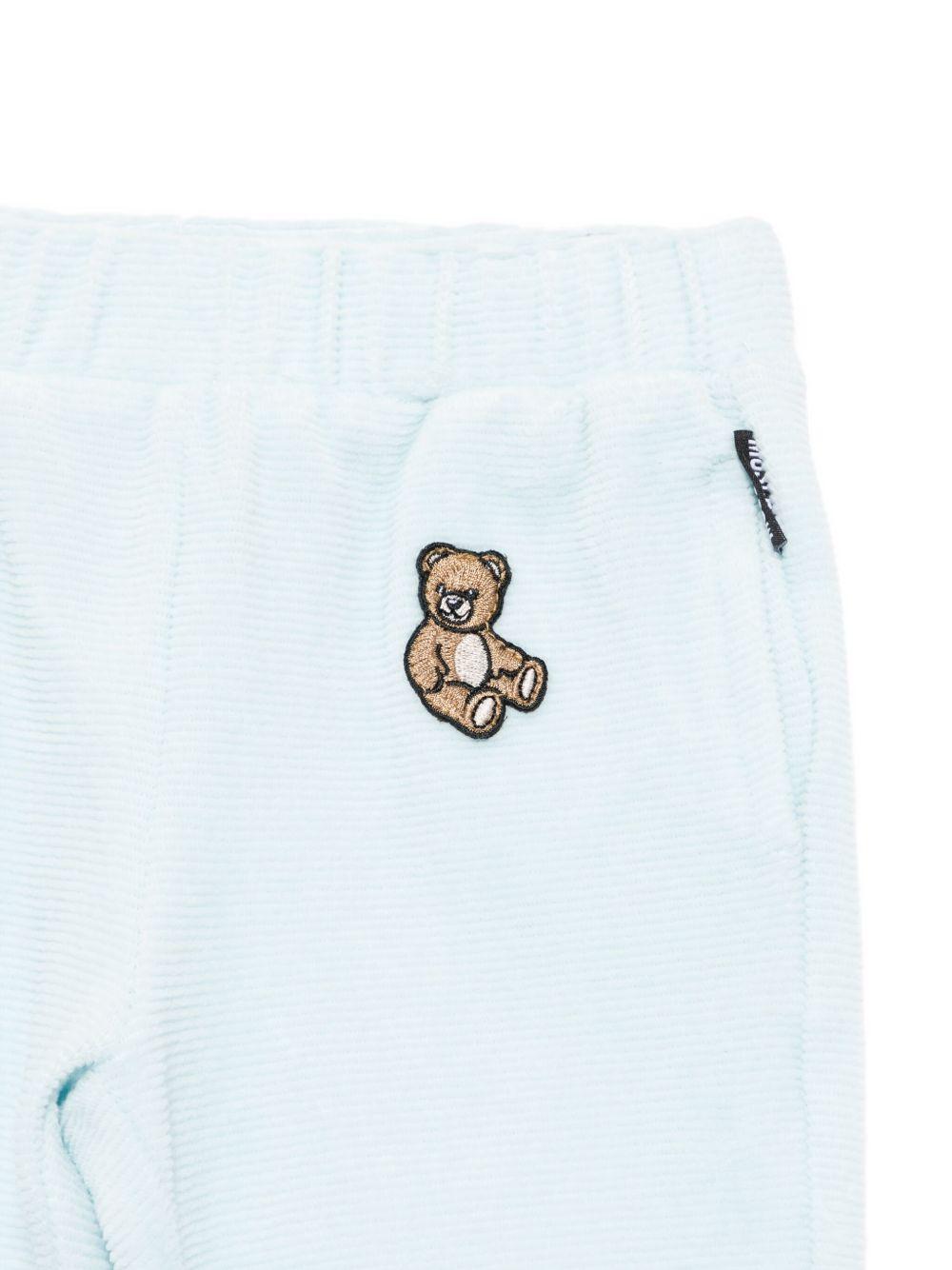 Completo felpa e pantaloni per neonato Moschino Kids azzurra con ricamo orsetto - Rubino Kids