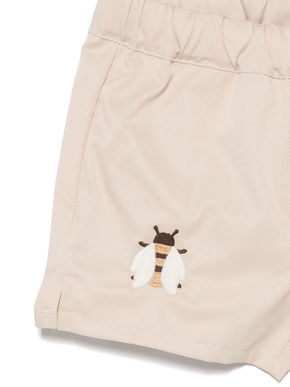 Costume da bagno per neonato Donsje Mees beige con spacchetti laterali - Rubino Kids