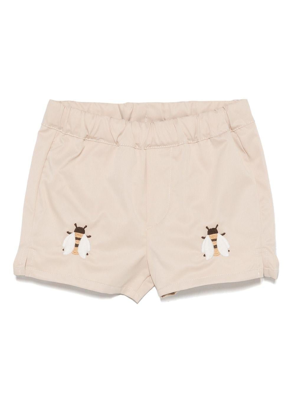 Costume da bagno per neonato Donsje Mees beige con spacchetti laterali - Rubino Kids