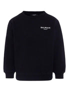 Felpa per bambino Balmain Kids nera con stampa logo sul petto - Rubino Kids