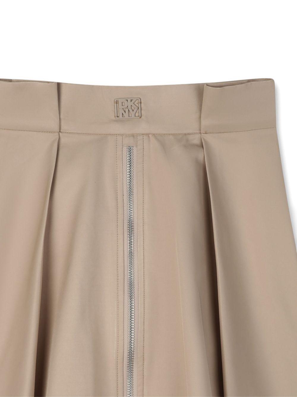 Gonna per bambina DKNY Kids beige con dettagli plissettati - Rubino Kids