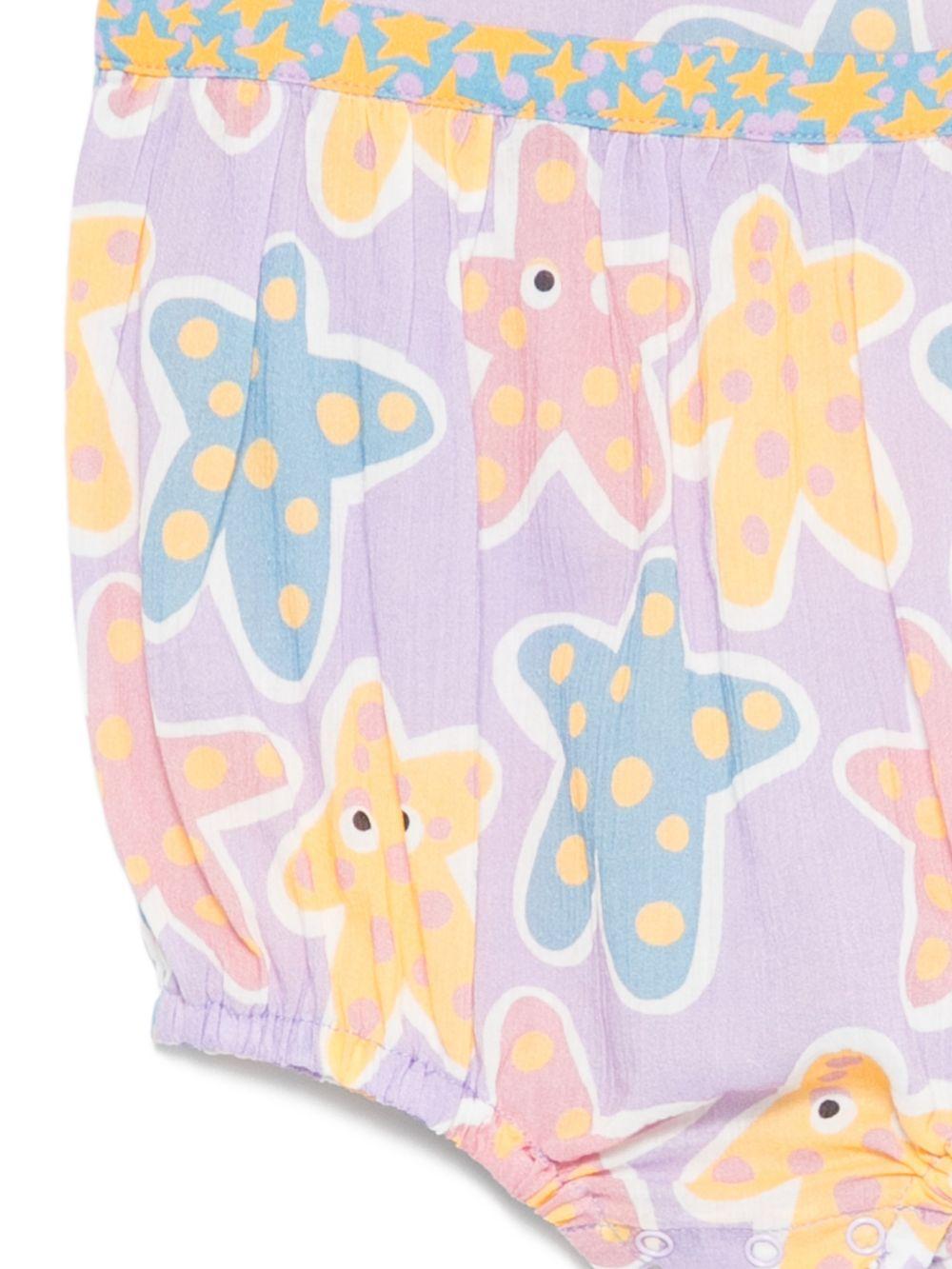 Tutina per neonata Stella McCartney Kids viola con stampa stelle marine all-over TYA032 Z3603 539MC STELLA McCARTNEY KIDS