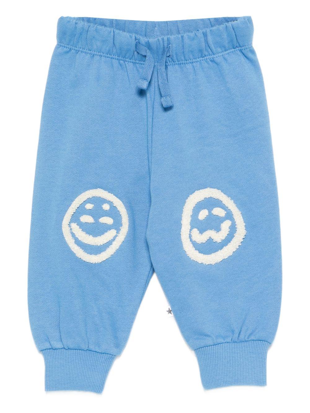Pantaloni Simeon sportivi per neonato Molo azzurri con toppe smile sulle ginocchia 6S26I205 5615 MOLO