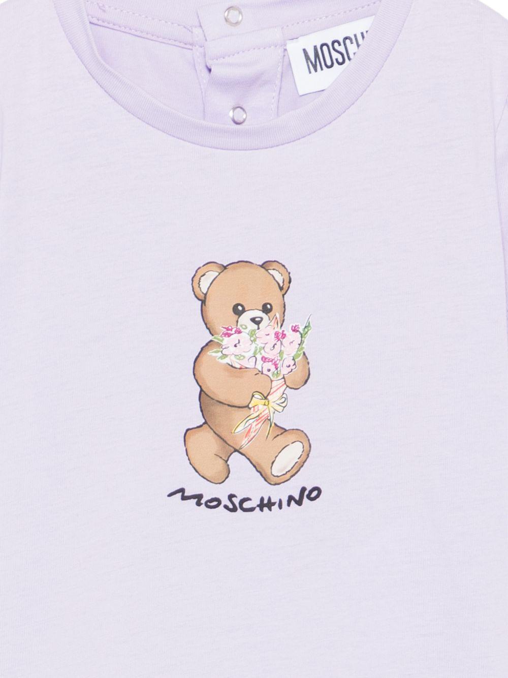 T-shirt per neonata Moschino Kids viola con stampa Teddy con mazzo di fiori MDM03NLAA02 51683 MOSCHINO KIDS
