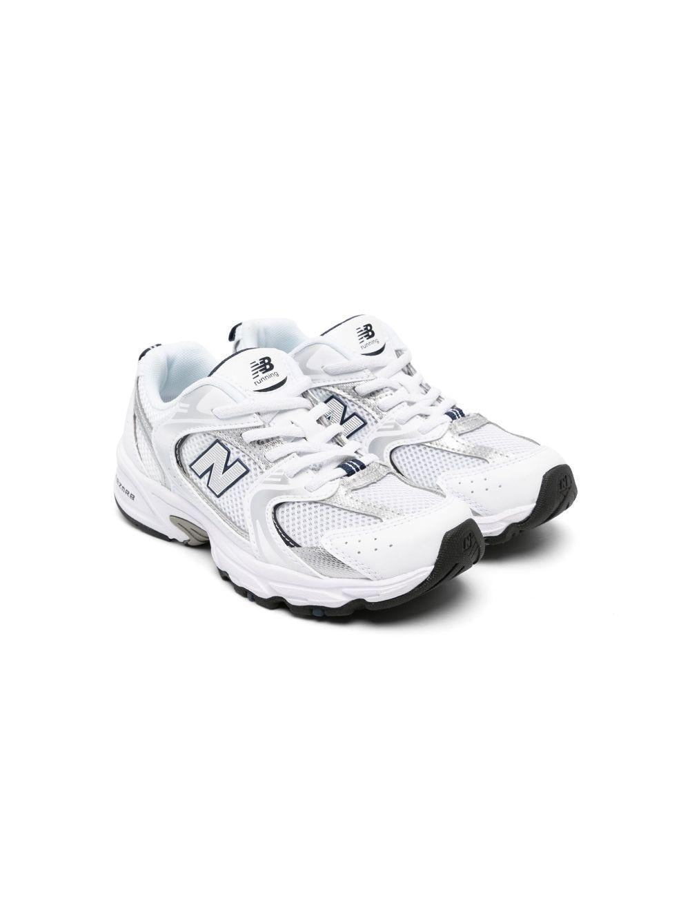 Sneakers 530 per bambini New Balance Kids bianche con design a inserti grigi PZ530 SB1 NEW BALANCE KIDS