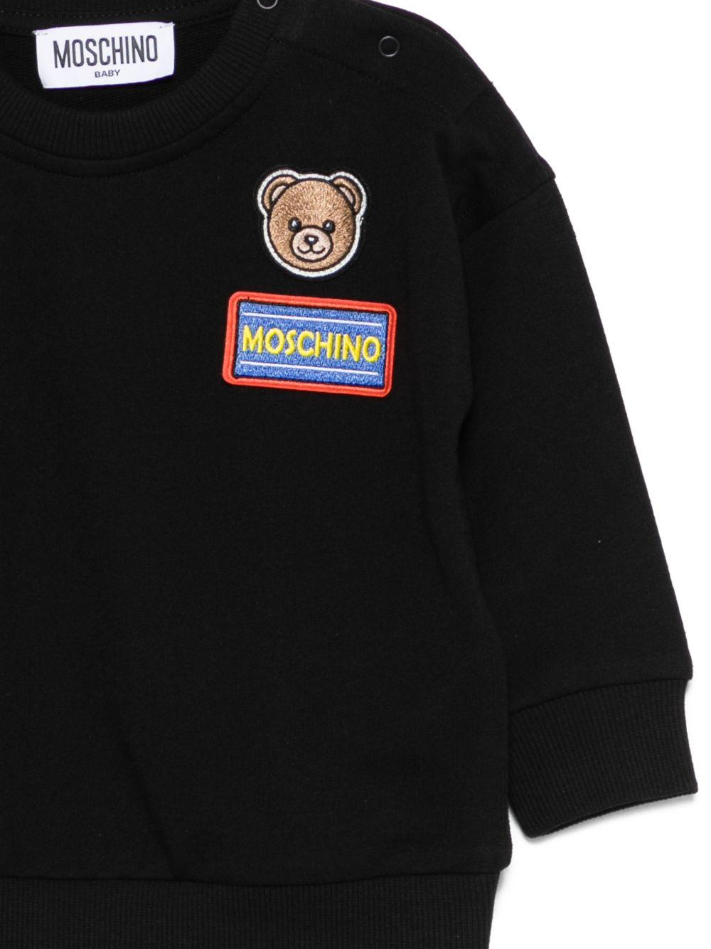 Felpa per neonati Moschino Kids nera con dettagli in rilievo M9F03QLCA19 60100 MOSCHINO KIDS