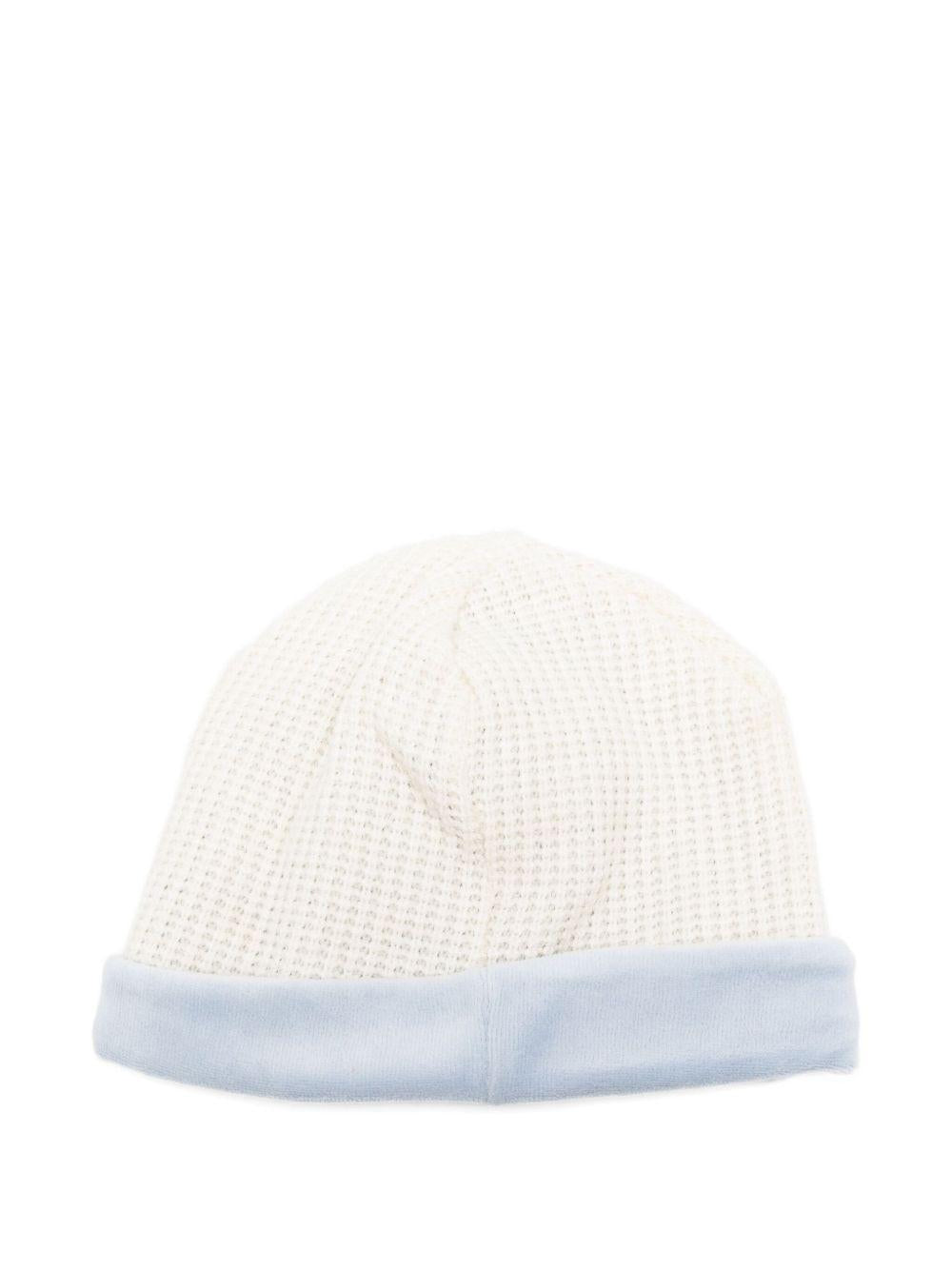 Berretto per neonata La Stupenderia bianco con decorazione azzurra 1TBCP10 M20L24 LA STUPENDERIA