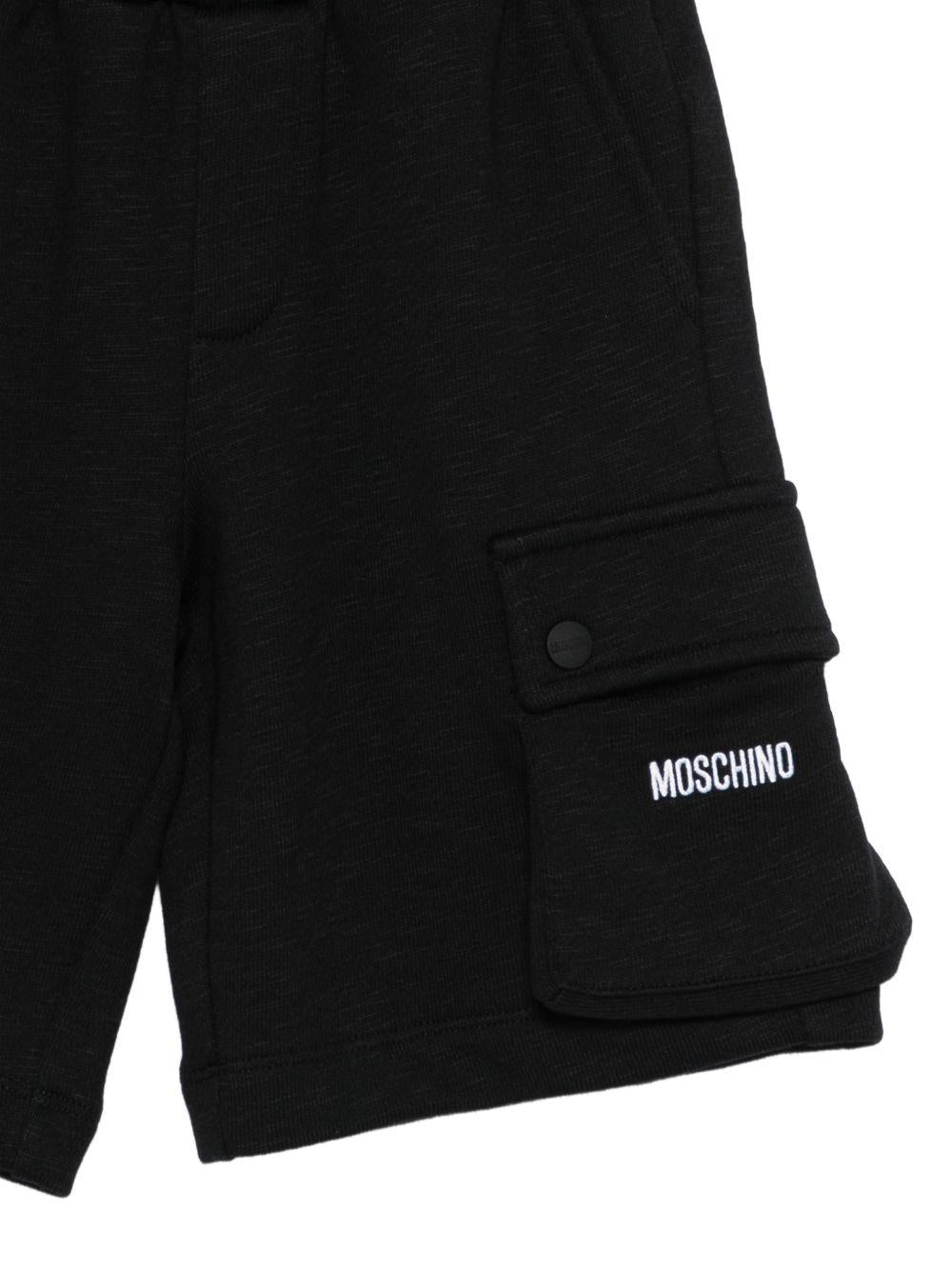 Shorts per bambino Moschino Kids neri con logo sul davanti HUQ02QLCA88 60100 MOSCHINO KIDS