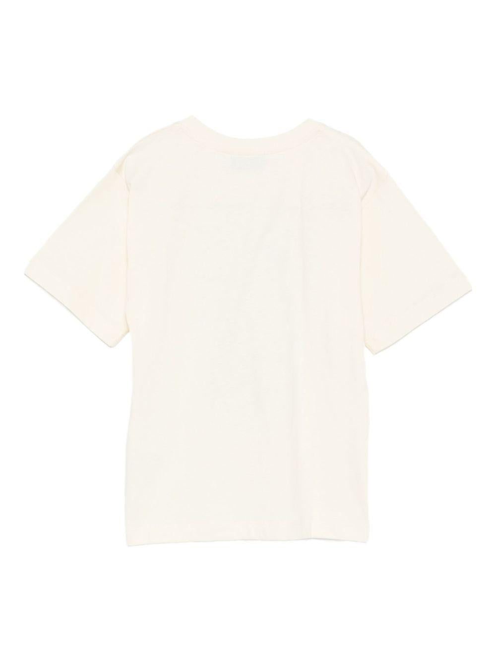 T-shirt per bambini Moschino Kids beige con stampa e logo HNM05GLAA20 10123 MOSCHINO KIDS