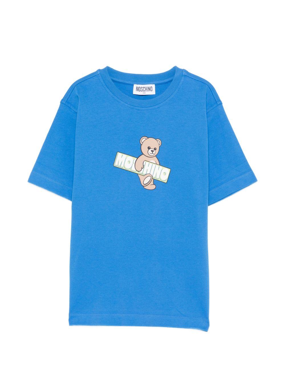 T-shirt per bambini Moschino Kids azzurra con stampa Teddy Bear sul davanti HYM03SLFA07 40630 MOSCHINO KIDS