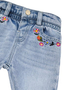 Jeans con ricamo a fiori per neonarto Moschino Kids azzurro con passanti - Rubino Kids
