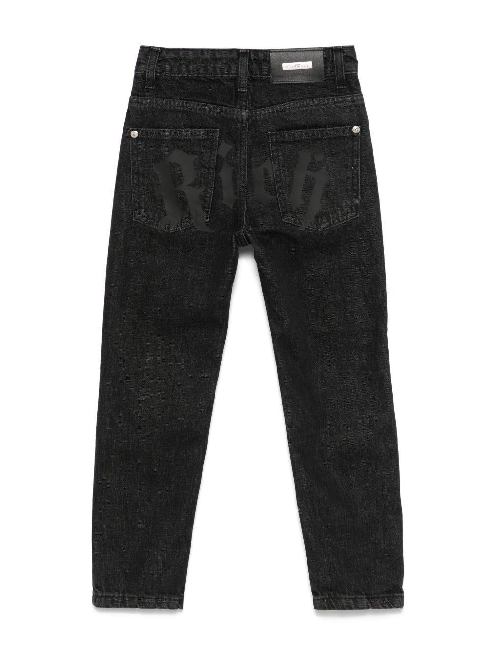 Jeans dritti con effetto vissuto per bambino John Richmond Junior nero con passanti - Rubino Kids