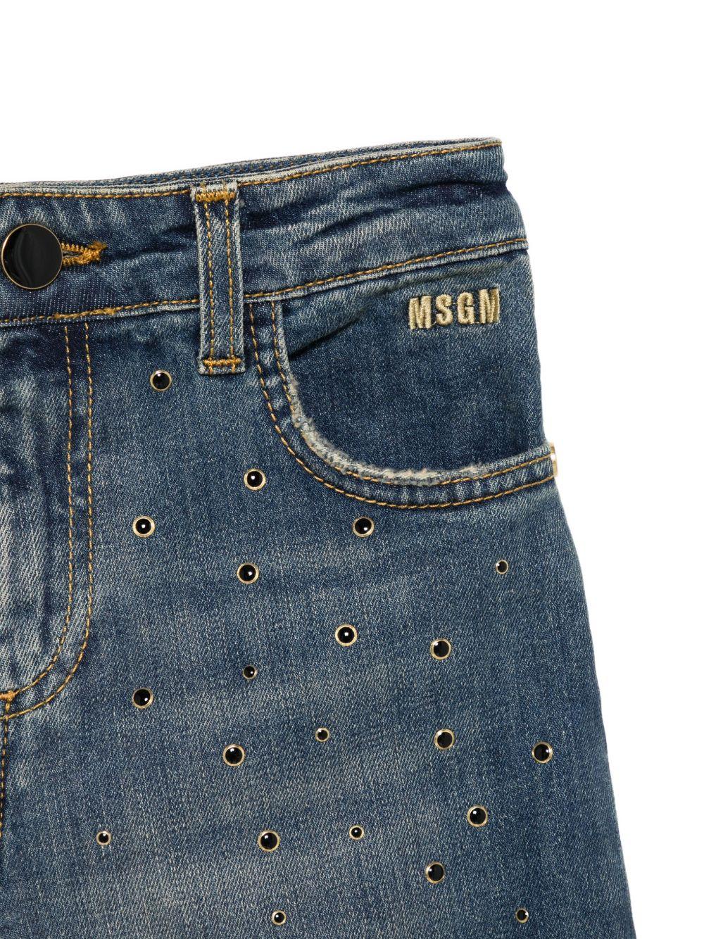 Jeans per bambina MSGm Kids in denim con borchie all - over - Rubino Kids