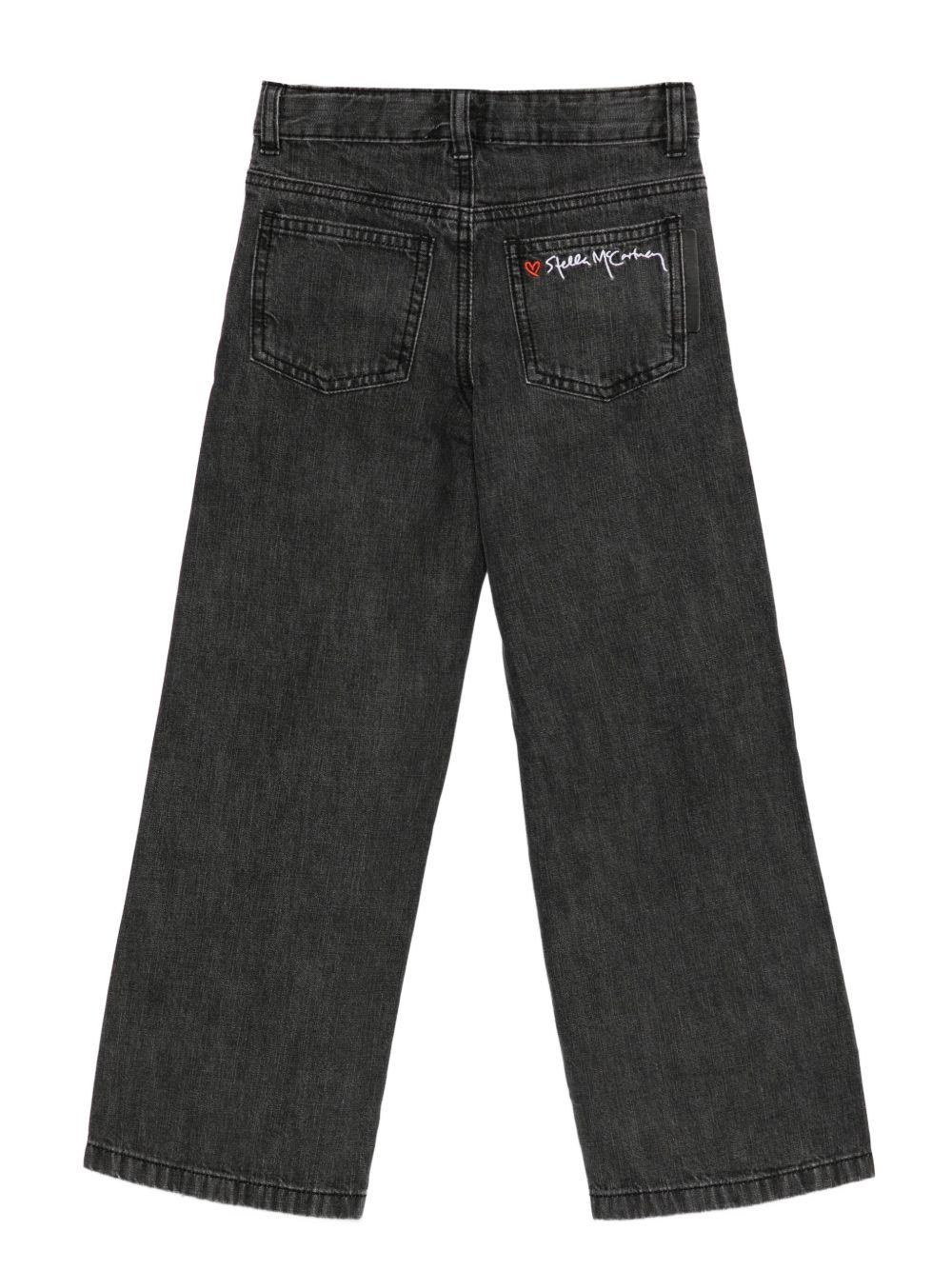 Jeans per bambina Stella McCartney Kids in denim nero con bottoni sulla gamba - Rubino Kids