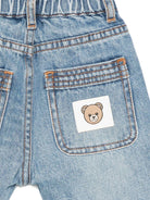Jeans per neonato Moschino Kids in denim con vita elasticizzata - Rubino Kids