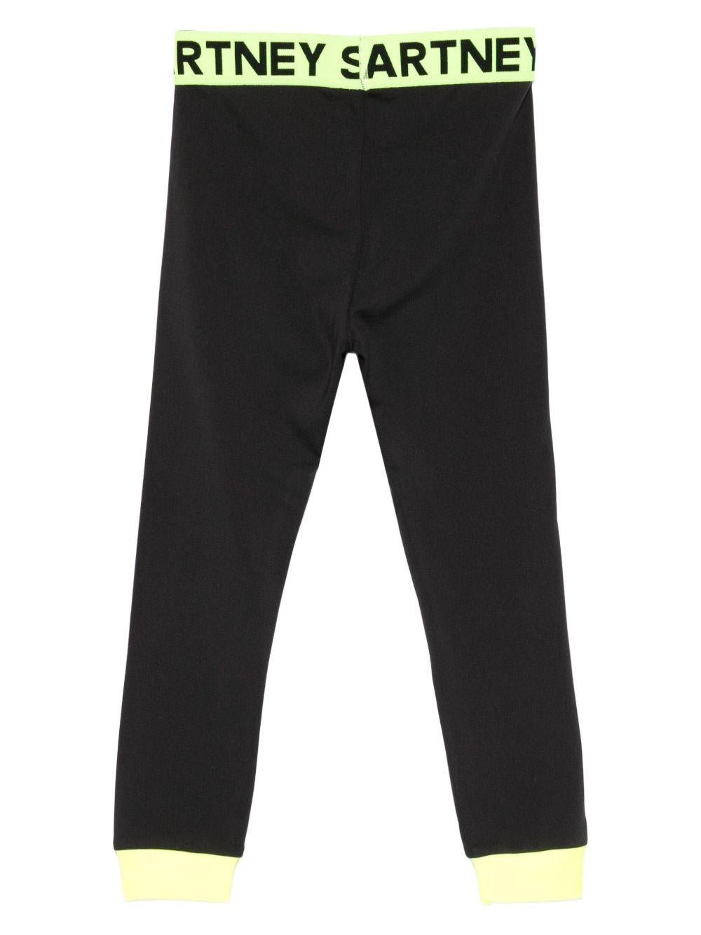 Leggings per bambina Stella McCartney Kids nero con banda logata - Rubino Kids