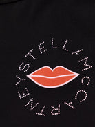Leggings per bambina Stella McCartney Kids nero con stampa labbra - Rubino Kids