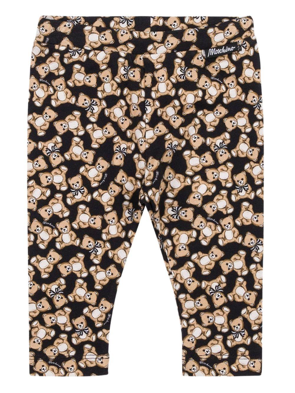 Leggins per neonata Moschino Kids neri con stampa Teddy Bear all - over - Rubino Kids