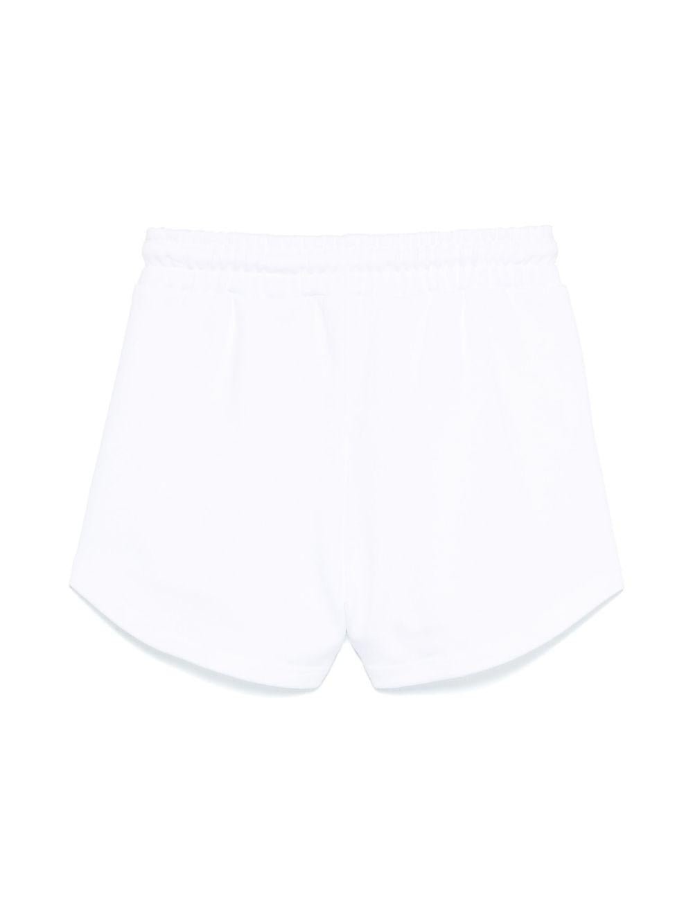 Pantaloncini con stampa logo per bambina MSGM Kids bianco con gamba larga - Rubino Kids