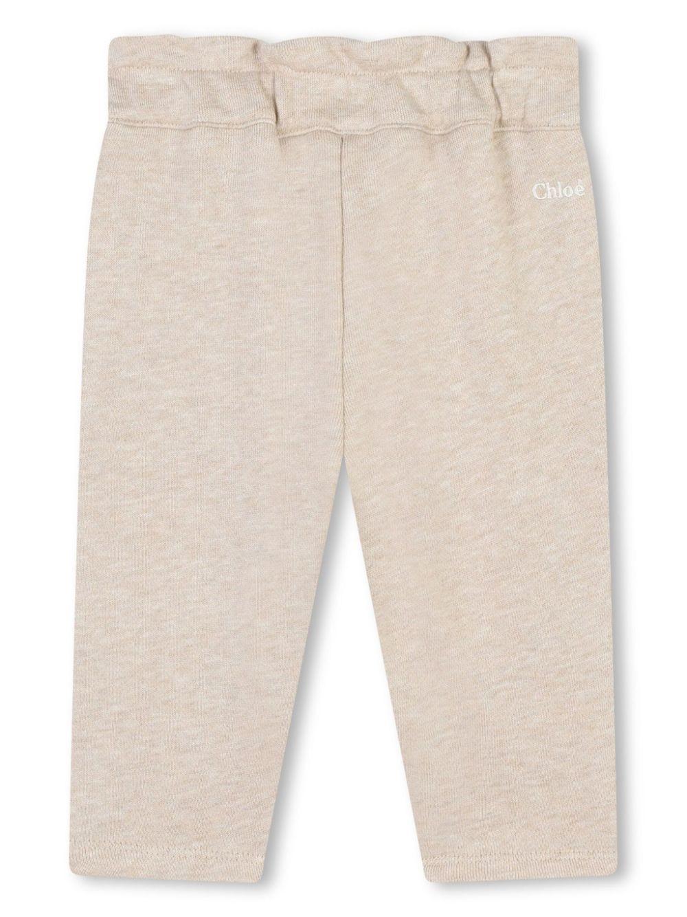 Pantaloni con fiocco per neonato Chloé Kids beige con taglio straight - Rubino Kids