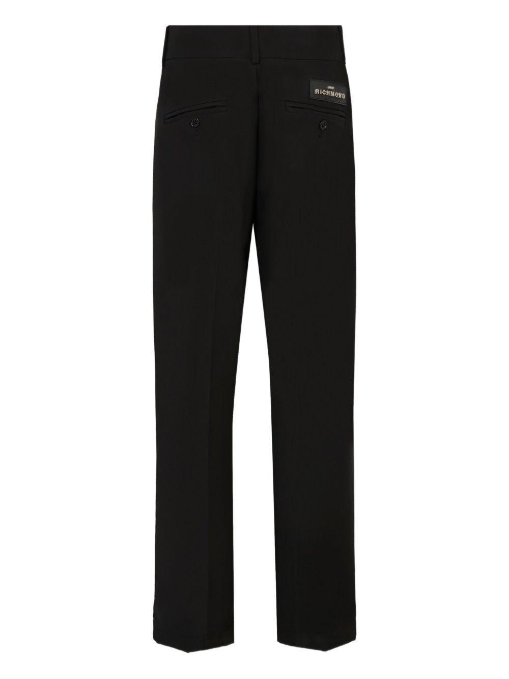 Pantaloni per bambina John Richmond Junior nero con pieghe frontali - Rubino Kids