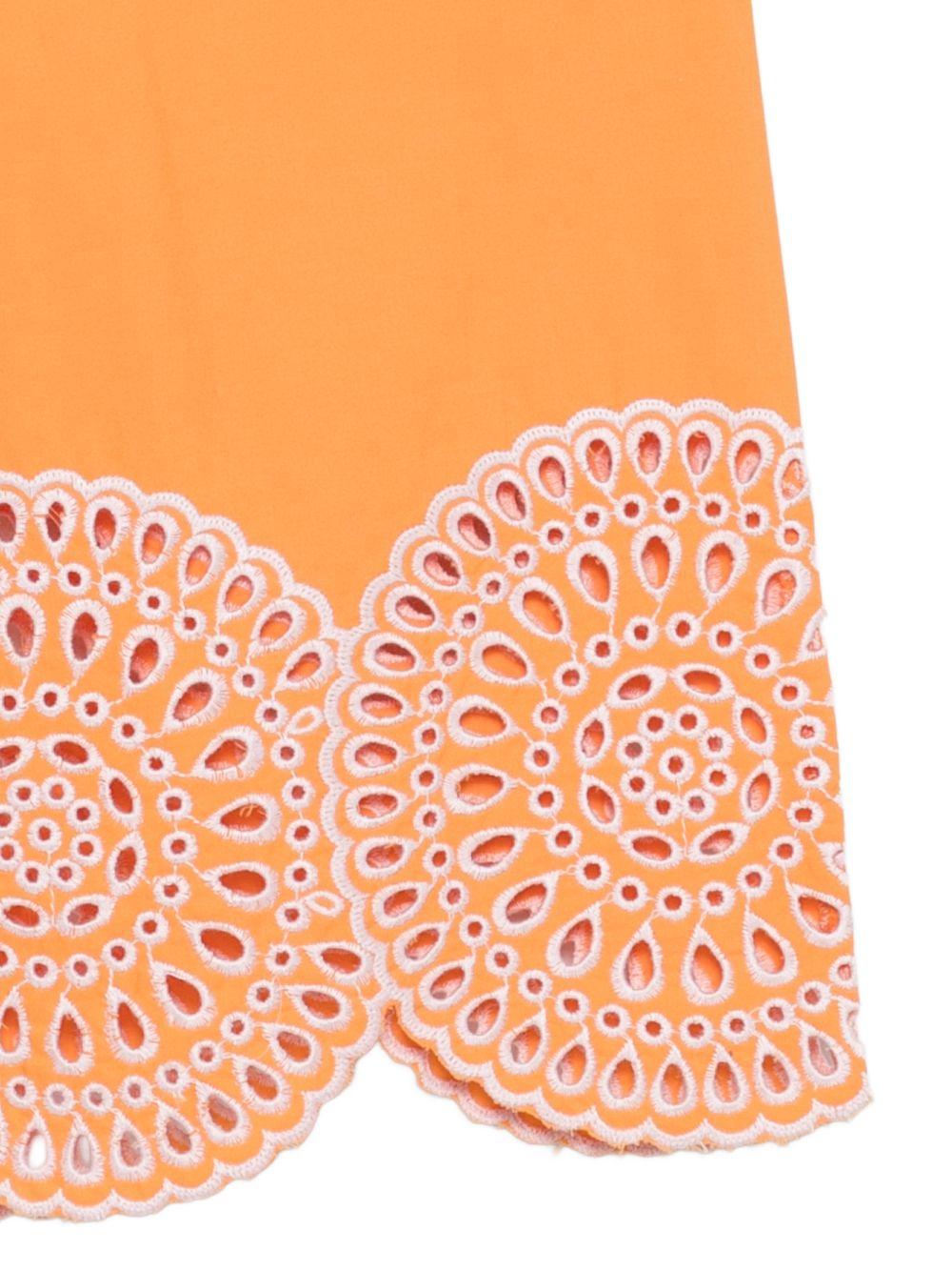 Pantaloni per bambina Stella McCartney Kids arancioni con orlo smerlato - Rubino Kids