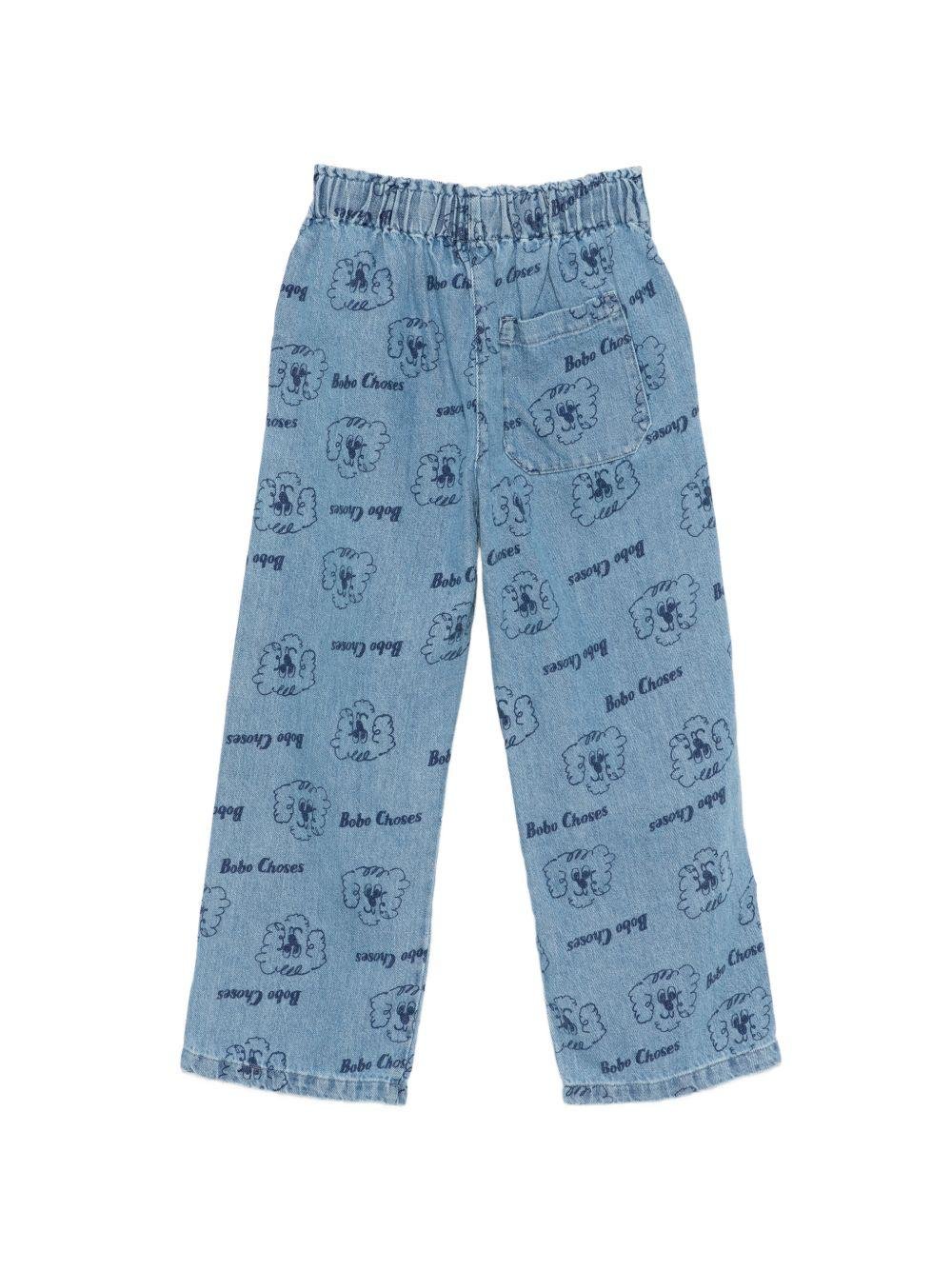 Pantaloni per bambino Bobo Choses denim con stampa Pickles The Dog all - over - Rubino Kids