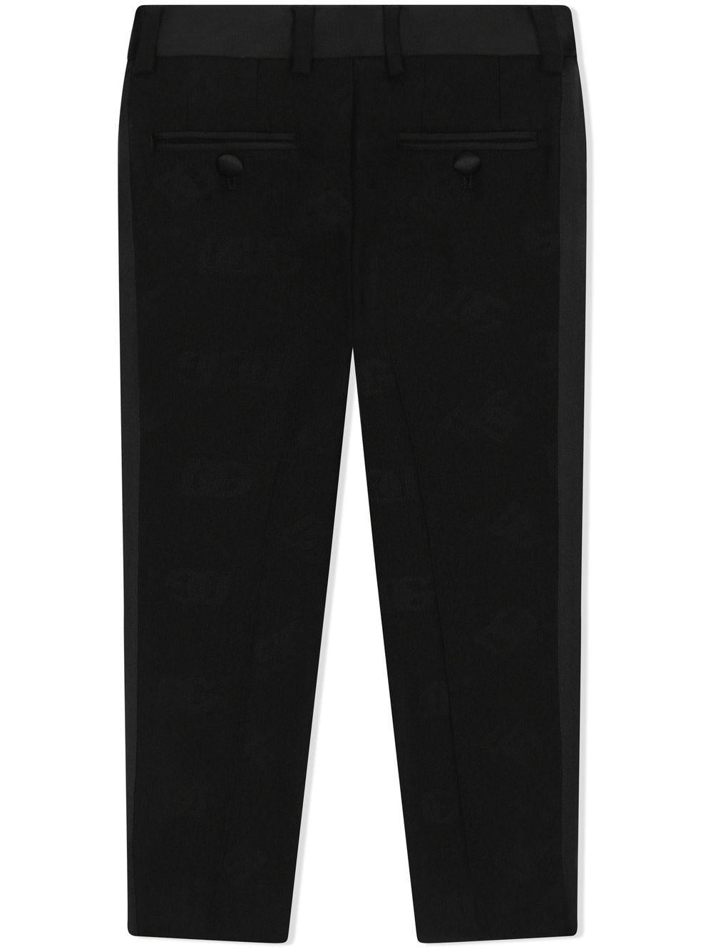 Pantaloni per bambino Dolce & Gabbana Kids nero con logo DG jacquard - Rubino Kids