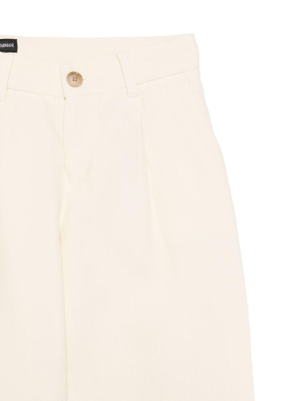 Pantaloni per bambino Emporio Armani Kids beige con dettagli plissettati - Rubino Kids