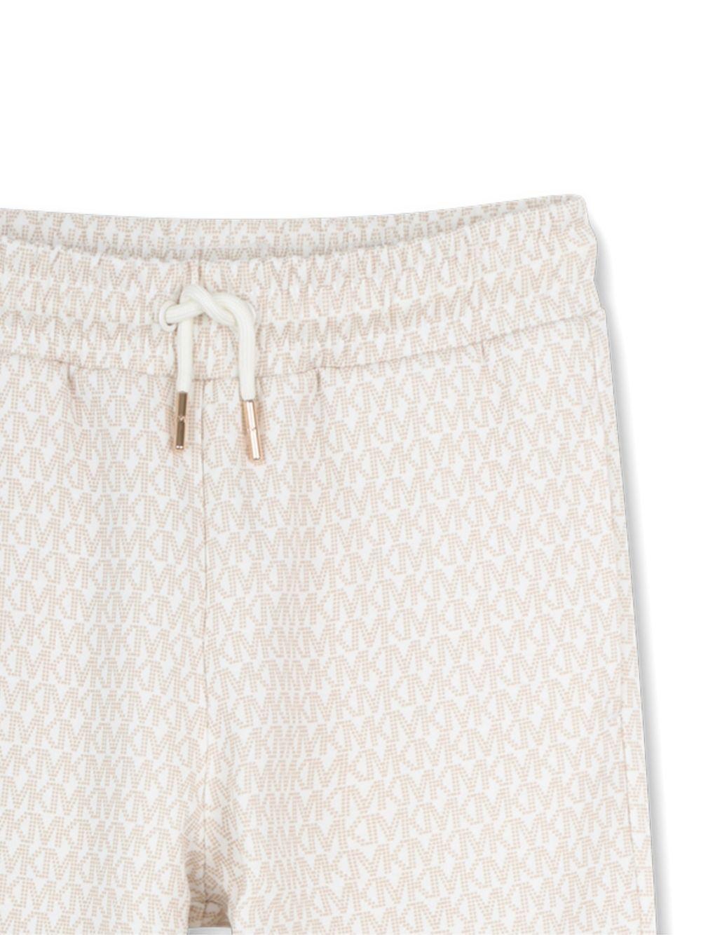 Pantaloni per bambino Michael Kors Kids bianchi con motivo all - over - Rubino Kids