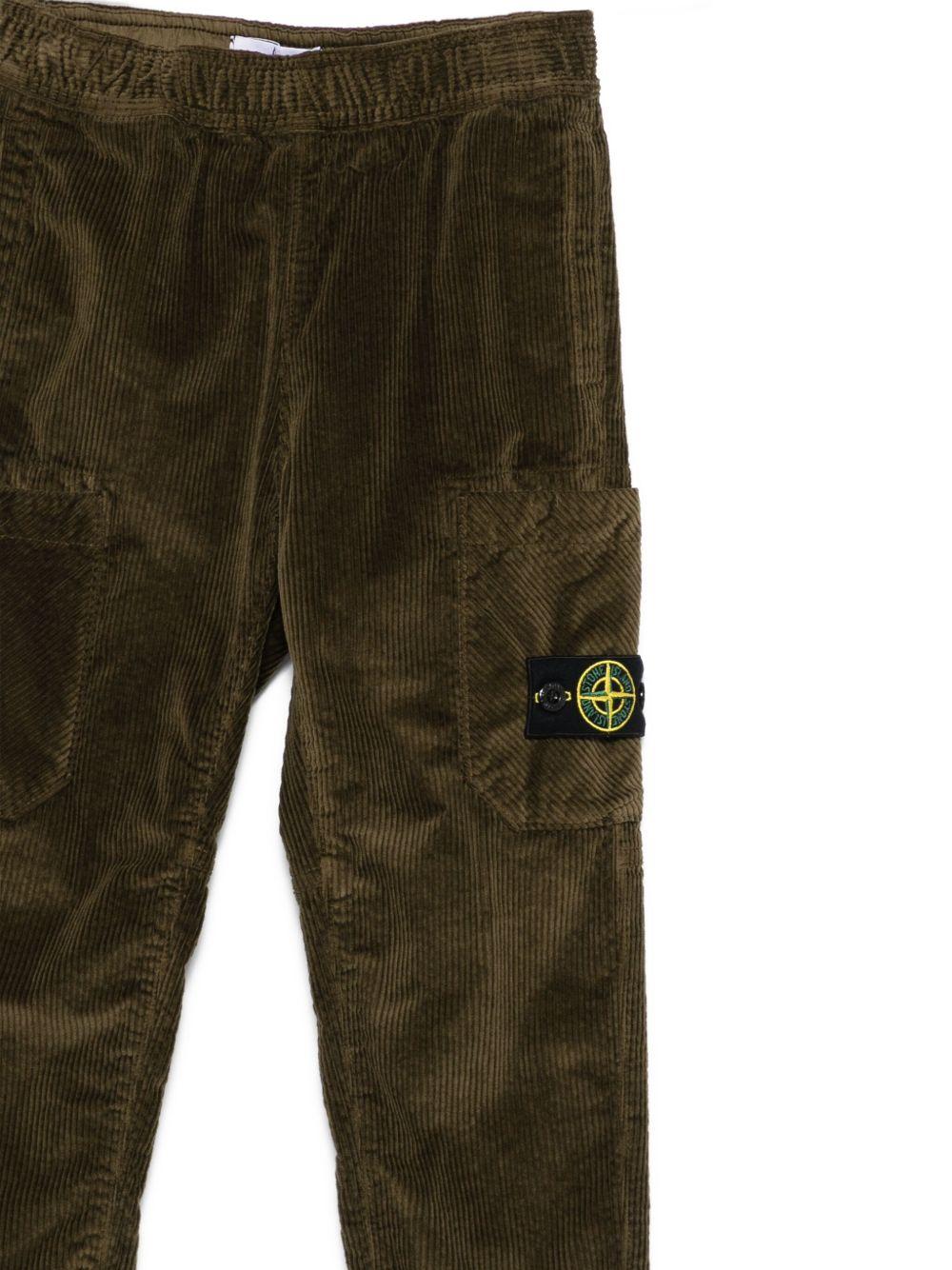 Pantaloni per bambino Stone Island Junior verde oliva in velluto a coste con tasche applicate - Rubino Kids