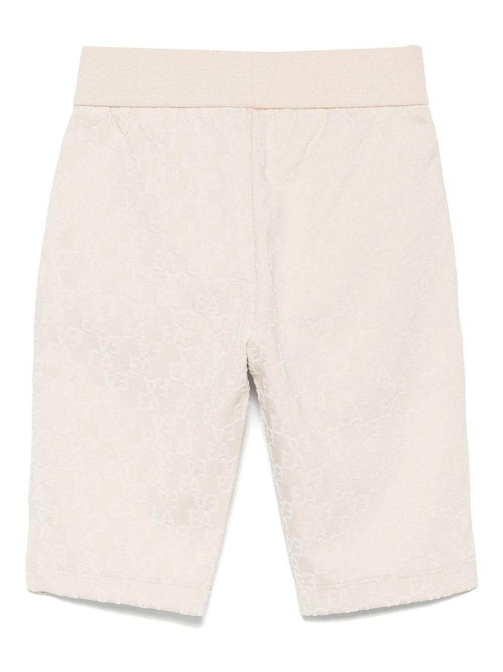 Pantaloni per neonato Emporio Armani Kids beige con motivo all - over - Rubino Kids