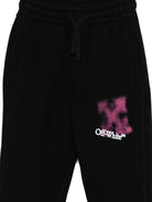 Pantaloni sportivi per bambina Off - White Kids neri con stampa effetto vernice spray - Rubino Kids