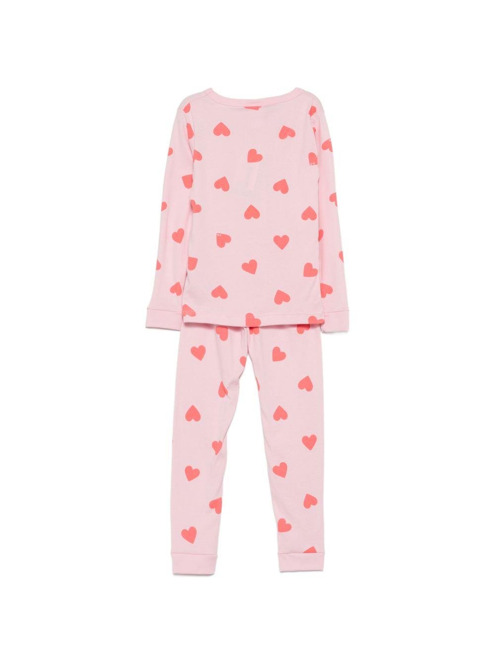 Pigiama per bambina Petit Bateau rosa con stampa a cuori all - over - Rubino Kids