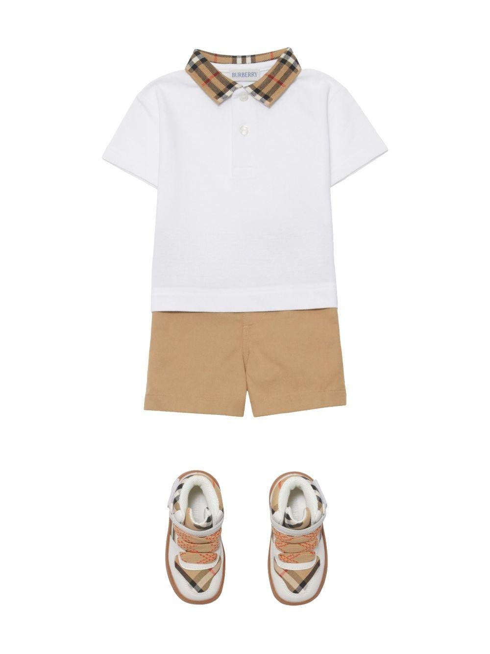 Polo per neonato Burberry Kids bianca con logo ricamato - Rubino Kids