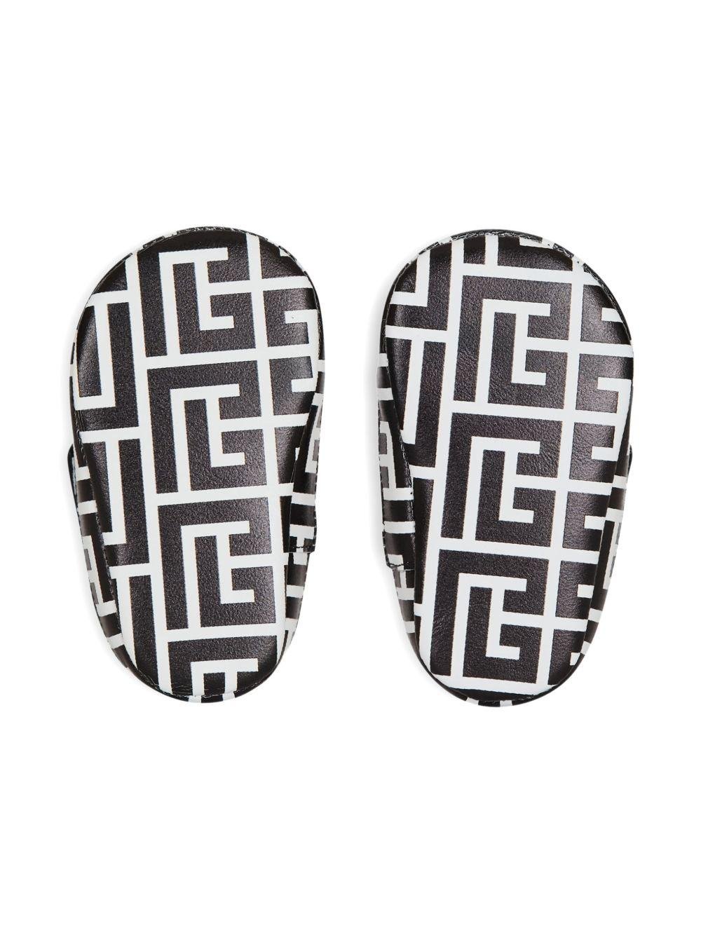 Scarpine primi passi per neonati Balmain Kids bianco e nere con cinturino con logo - Rubino Kids