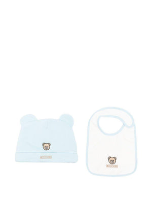 Set berretto e bavaglino per neonato Moschino Kids azzurro con motivo Teddy Bear