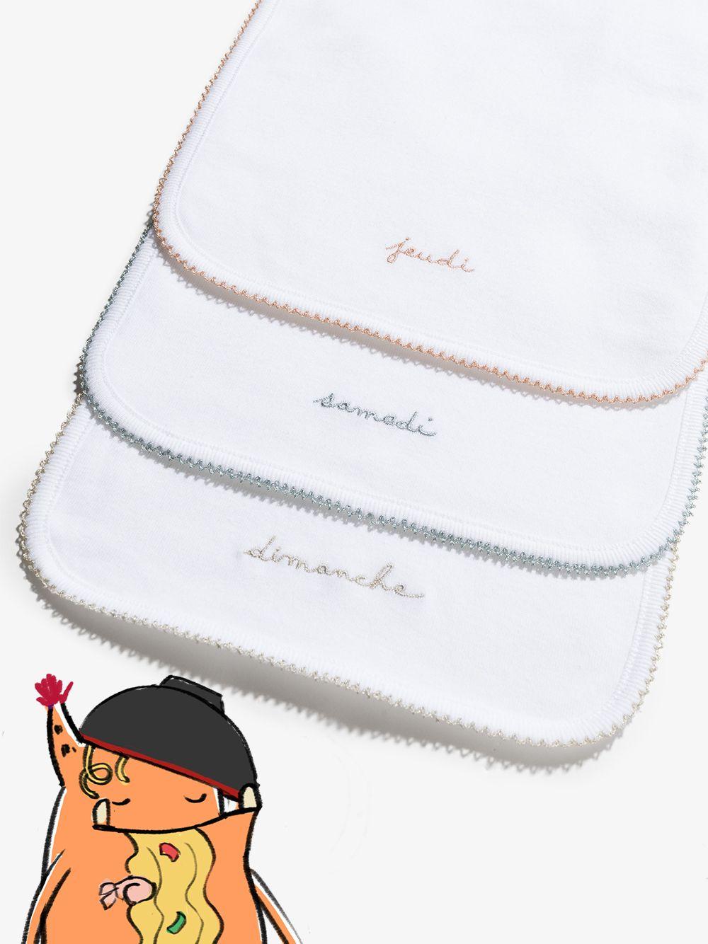 Set di sette bavaglini per neonati Bonpoint bianchi con ricamo giorni della settimana - Rubino Kids