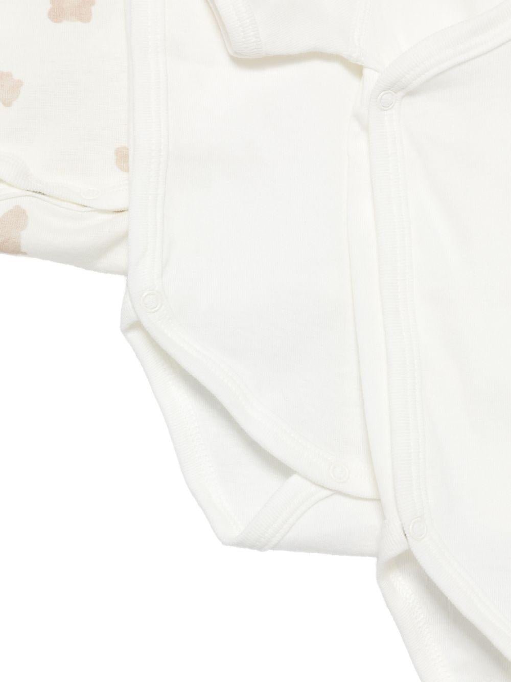 Set di tre tutine per neonati Petit Bateau bianchi con fantasie diverse - Rubino Kids