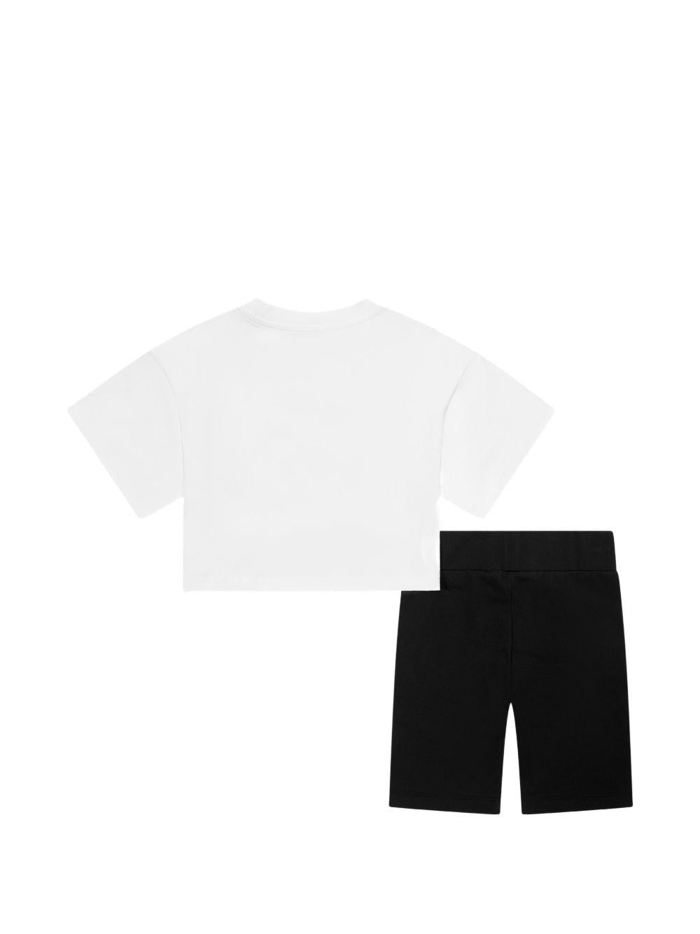 Set t-shirt e shorts per bambina Moschino Kids bianco e nero con motivo Teddy Bear - Rubino Kids