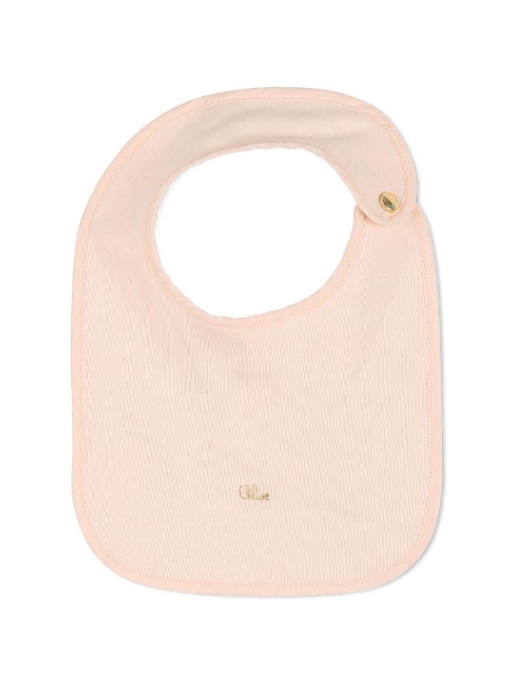 Set tutina, bavaglino e cappellino per neonata Chloé Kids rosa con volant - Rubino Kids