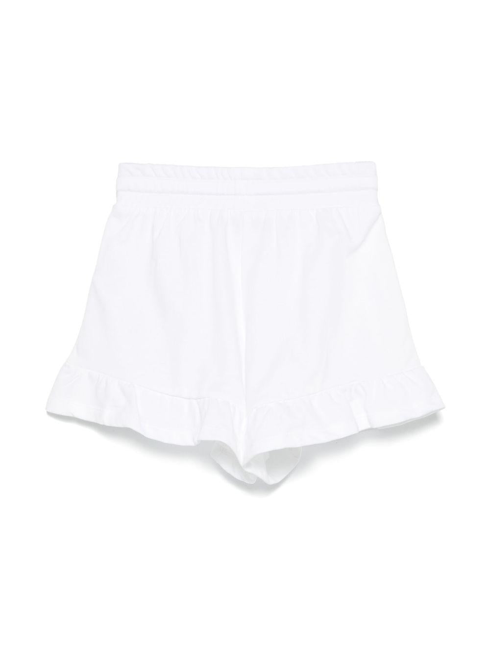 Shorts con stampa Leo Teddy per bambina Moschino Kids bianco con due tasche laterali - Rubino Kids