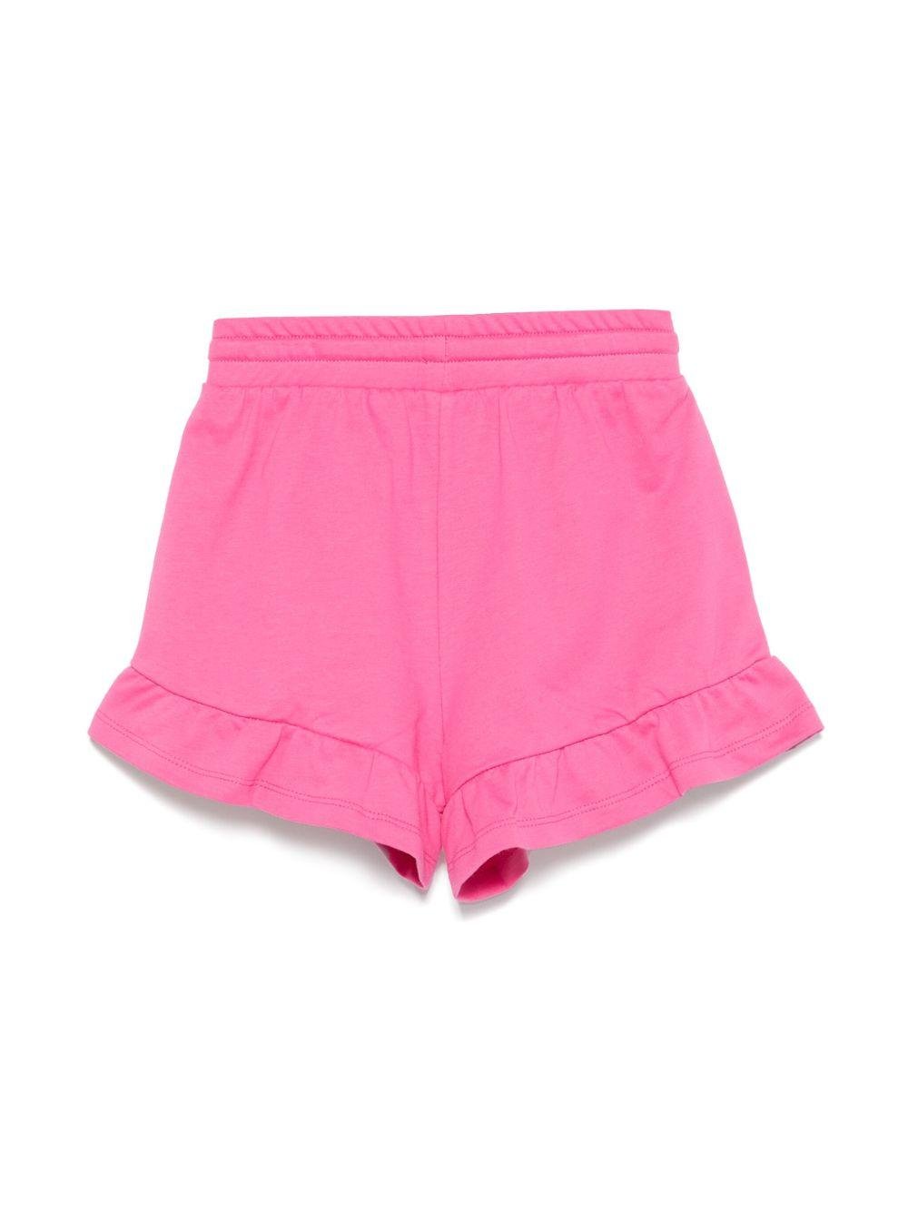 Shorts con stampa Leo Teddy per bambina Moschino Kids fucsia con due tasche laterali - Rubino Kids