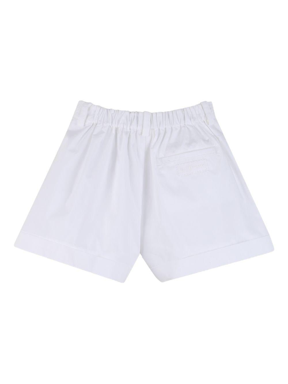 Shorts per bambina Givenchy Kids bianco con pieghe - Rubino Kids
