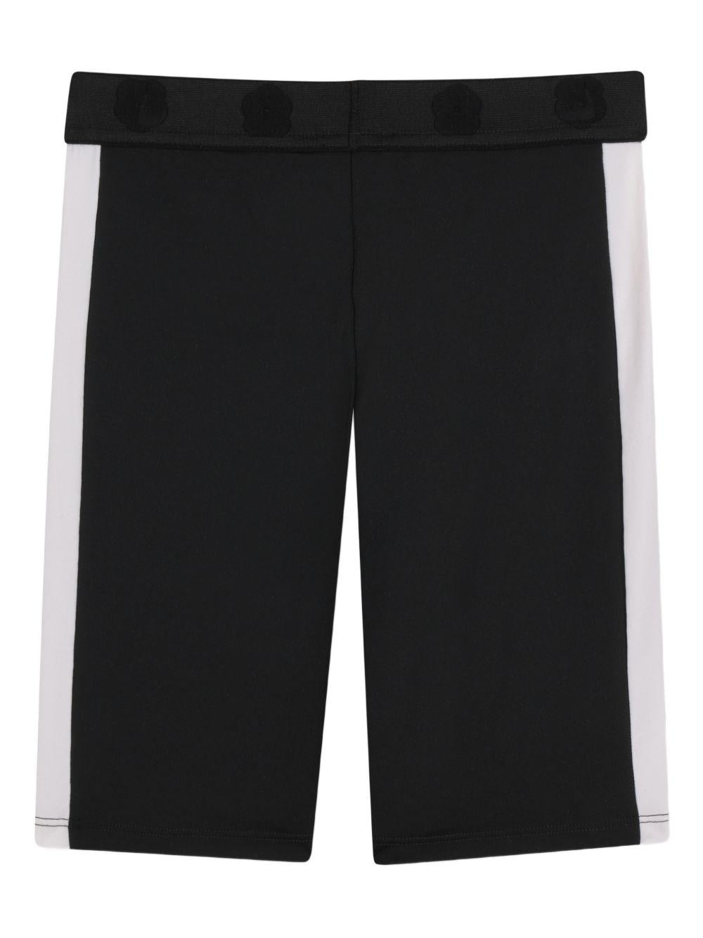 Shorts per bambina Kenzo Kids nero con logo a fiori - Rubino Kids