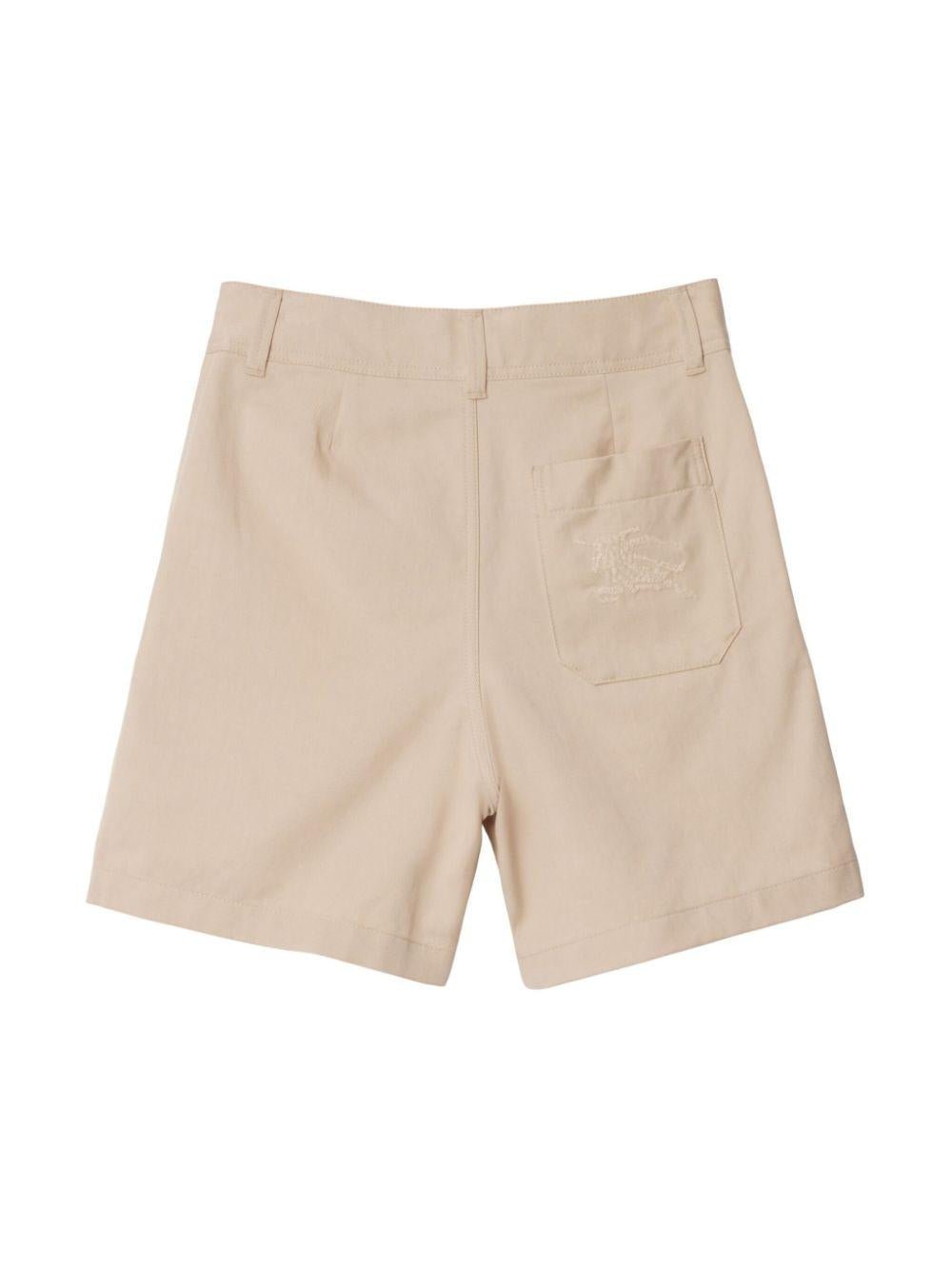 Shorts per bambino Burberry Kids beige con motivo con ricamo Equestrian Knight sul retro - Rubino Kids